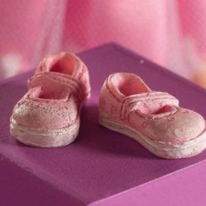 Chaussures de poupée