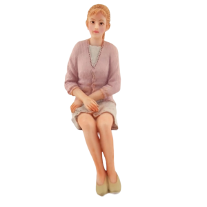 Figurine jeune femme assise